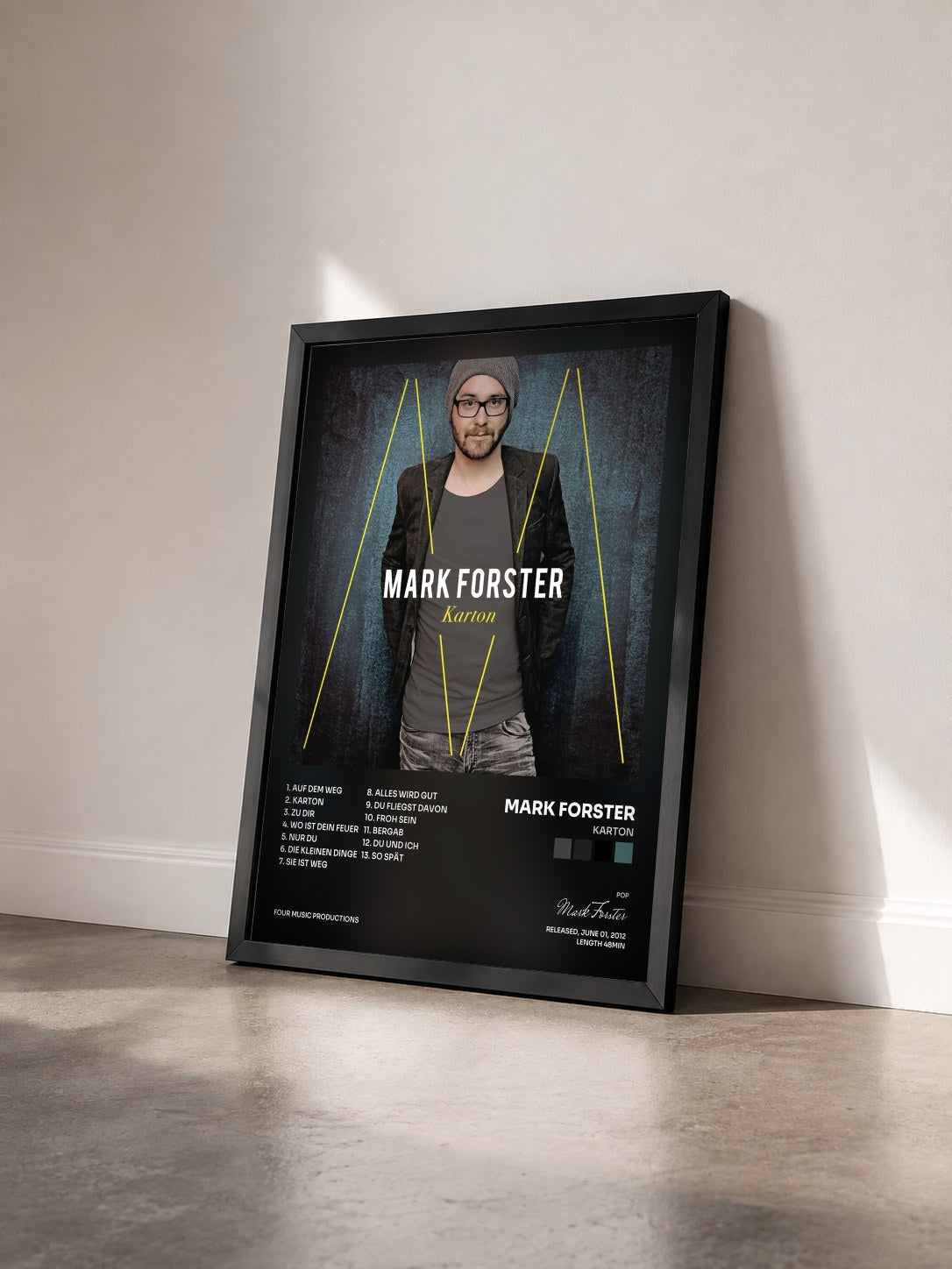 #noir Tableau de l'album Karton de Mark Forster vu de trois quarts, cadre noir
