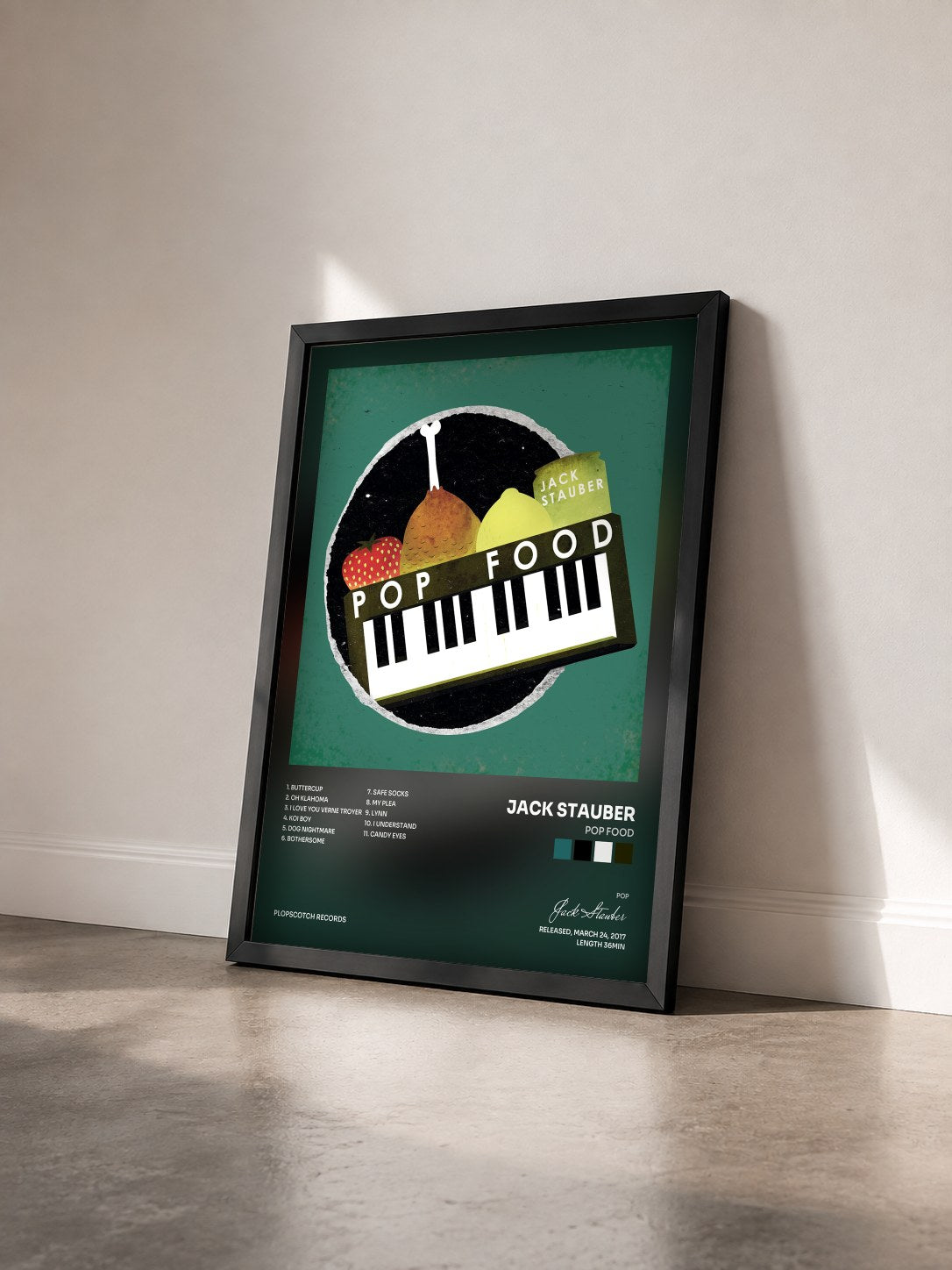 #noir Tableau de l'album Pop Food de Jack Stauber vu de trois quarts, cadre noir