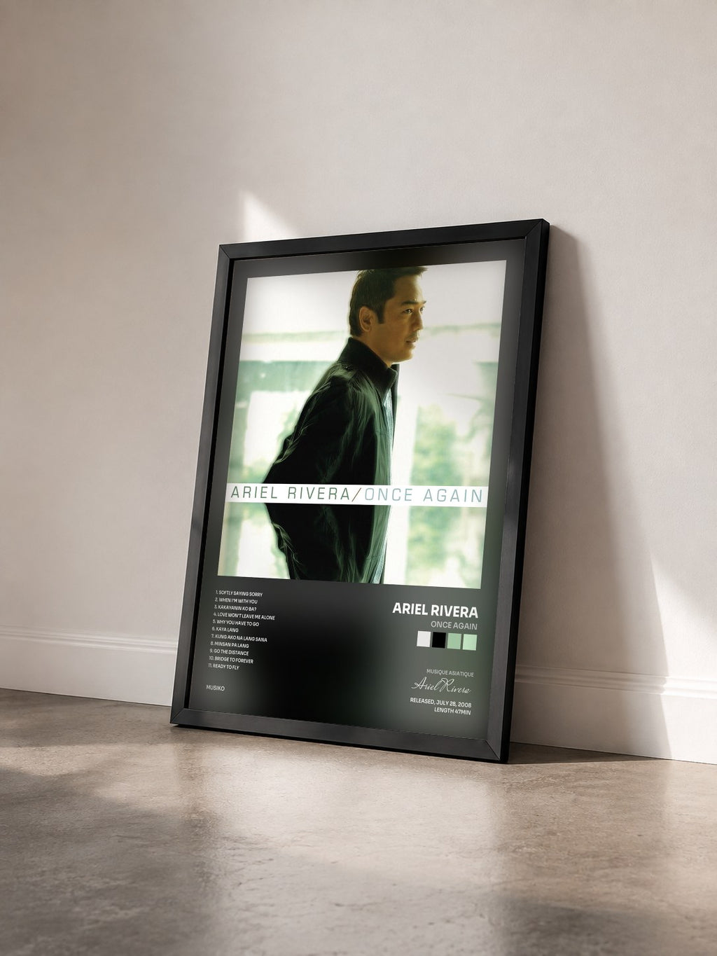 #noir Tableau de l'album Once Again de Ariel Rivera vu de trois quarts, cadre noir