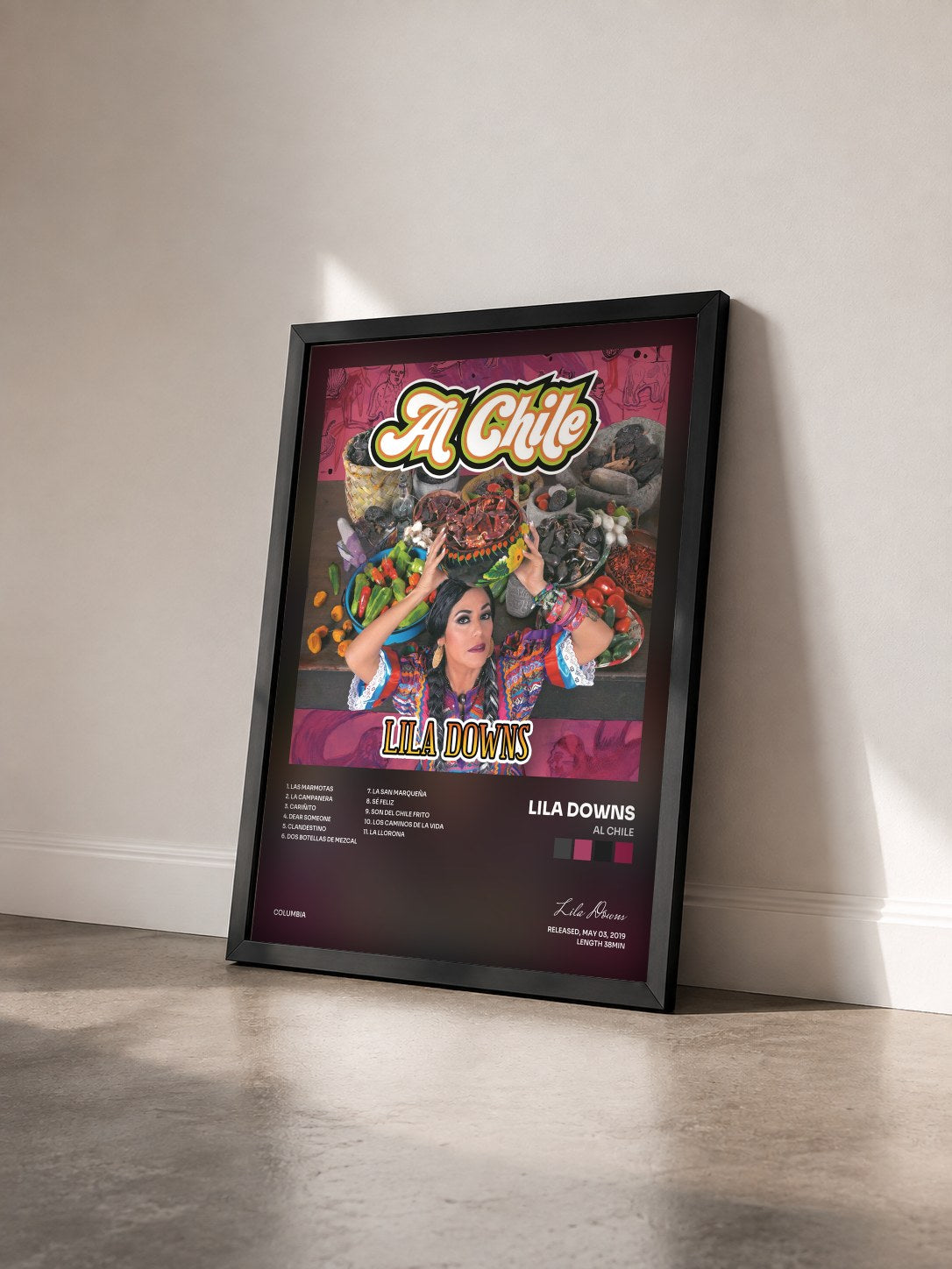 #noir Tableau de l'album Al Chile de Lila Downs vu de trois quarts, cadre noir