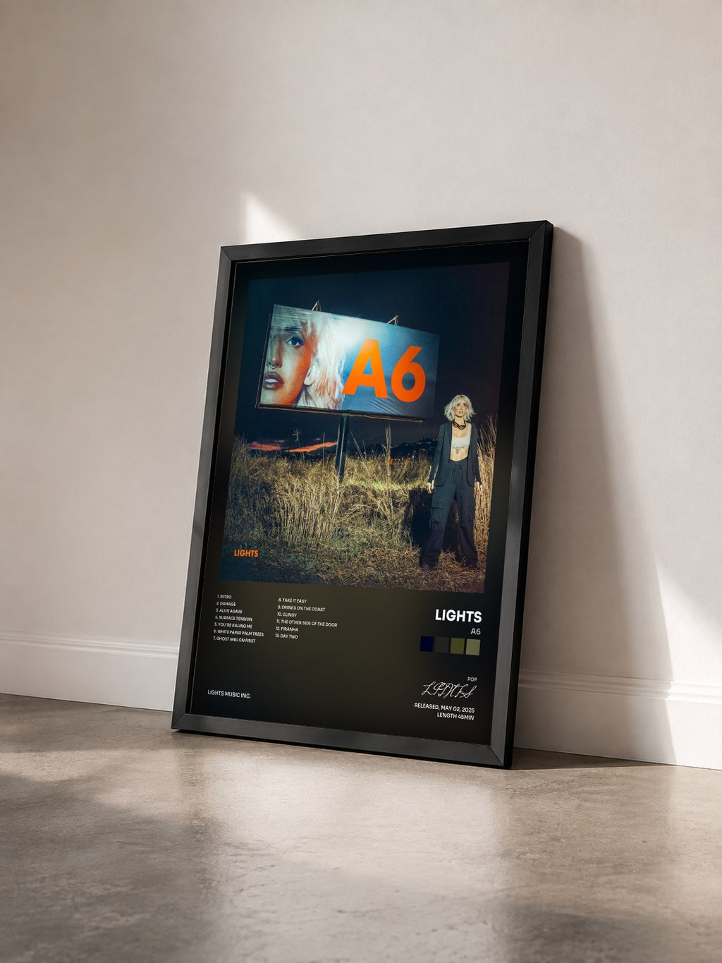 #noir Tableau de l'album A6 de LIGHTS vu de trois quarts, cadre noir