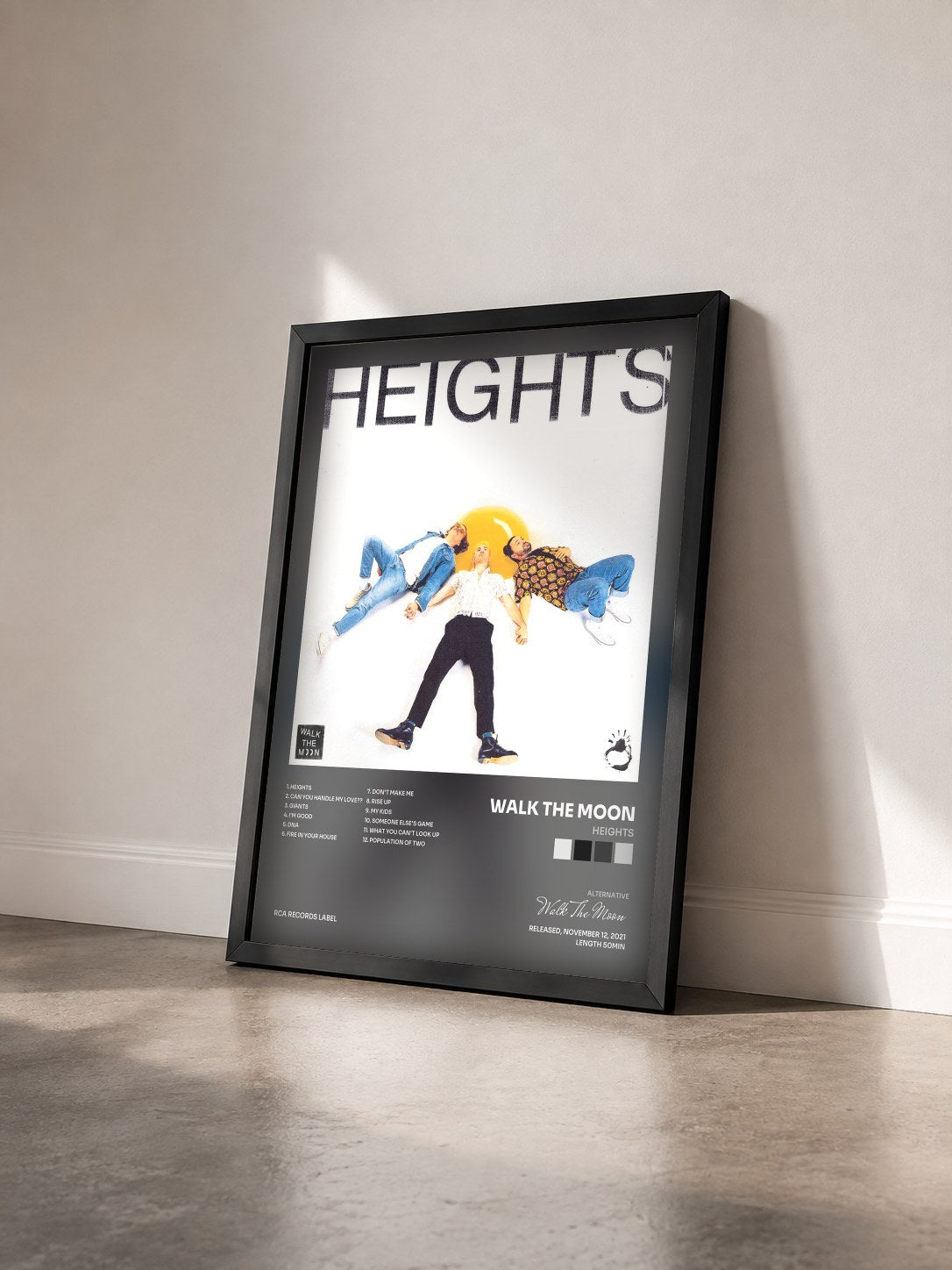 #noir Tableau de l'album HEIGHTS de Walk The Moon vu de trois quarts, cadre noir