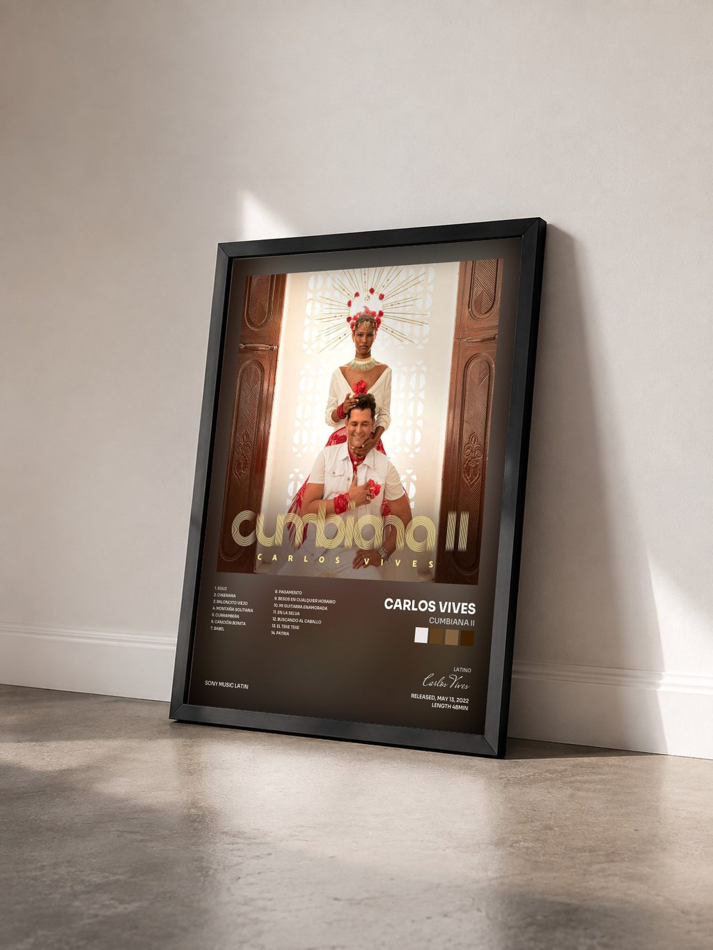 #noir Tableau de l'album Cumbiana II de Carlos Vives vu de trois quarts, cadre noir