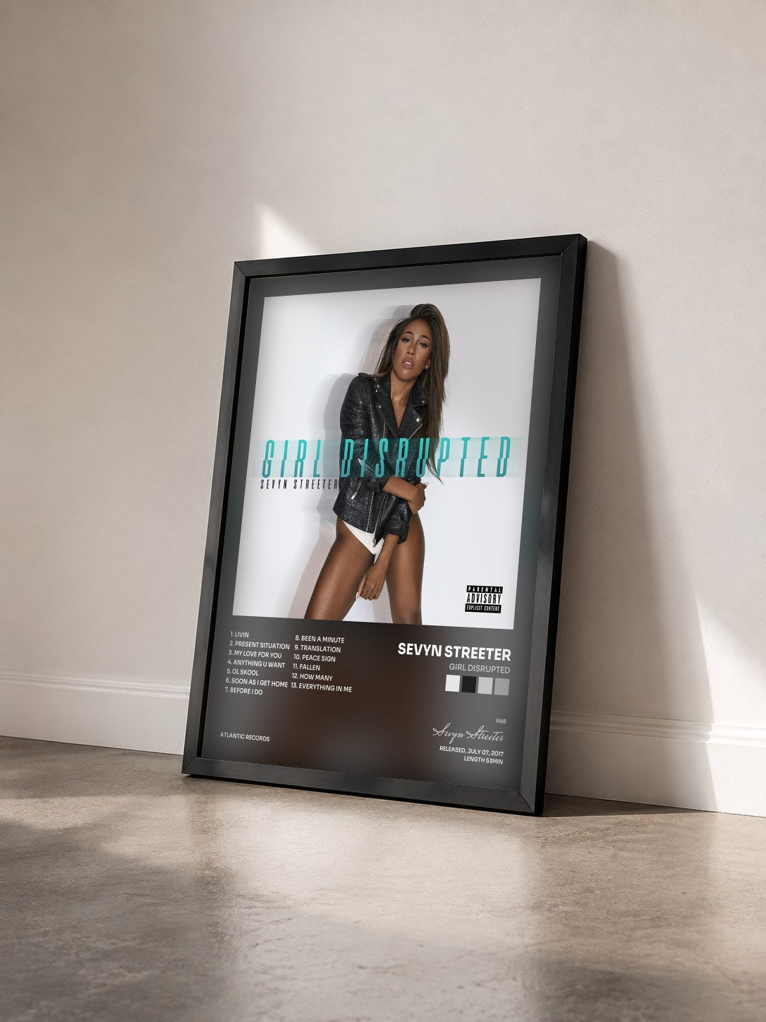 #noir Tableau de l'album Girl Disrupted de Sevyn Streeter vu de trois quarts, cadre noir
