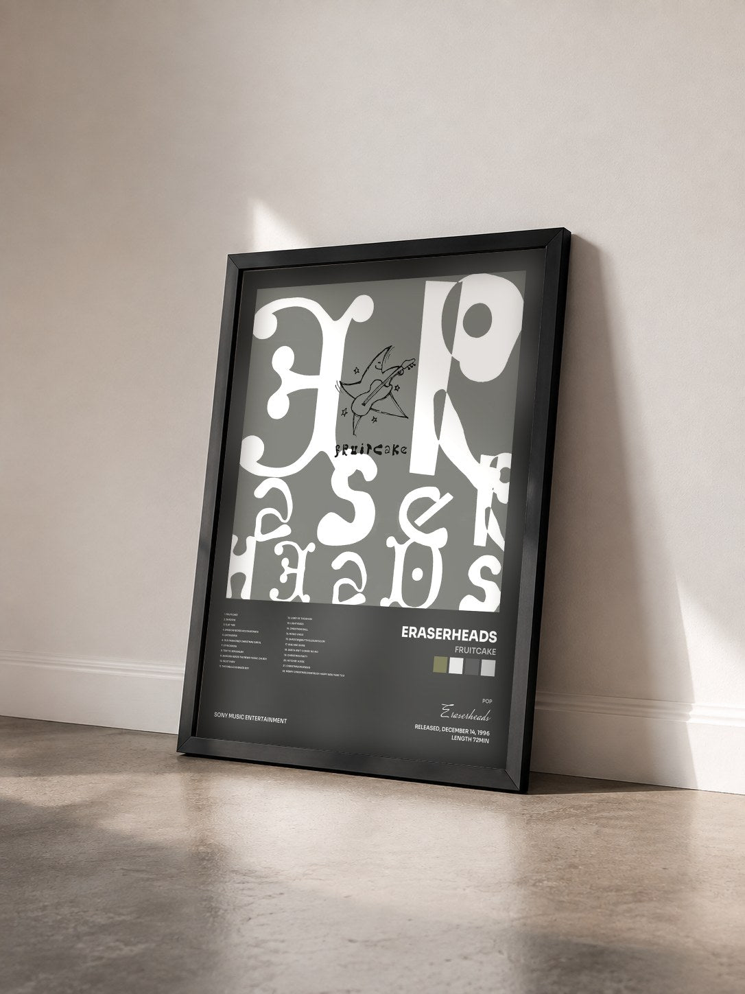 #noir Tableau de l'album Fruitcake de Eraserheads vu de trois quarts, cadre noir