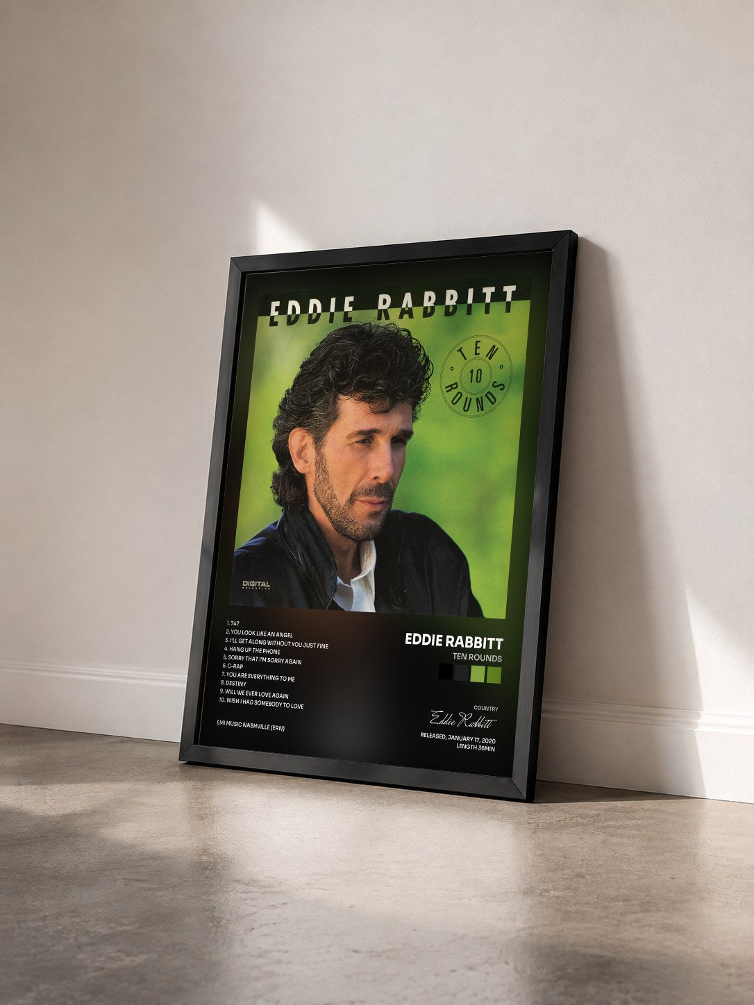 #noir Tableau de l'album Ten Rounds de Eddie Rabbitt vu de trois quarts, cadre noir
