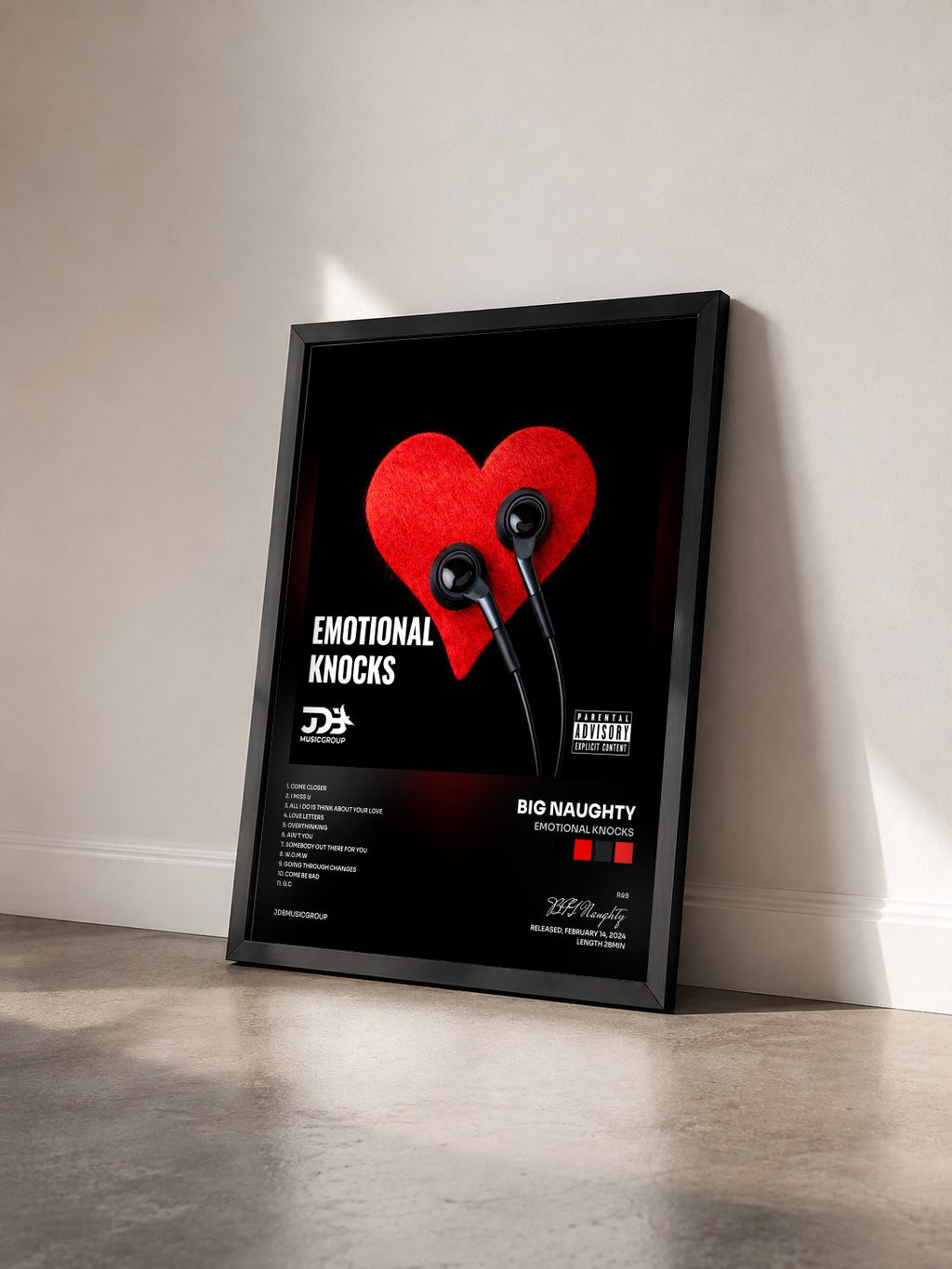 #noir Tableau de l'album Emotional Knocks de BIG Naughty vu de trois quarts, cadre noir