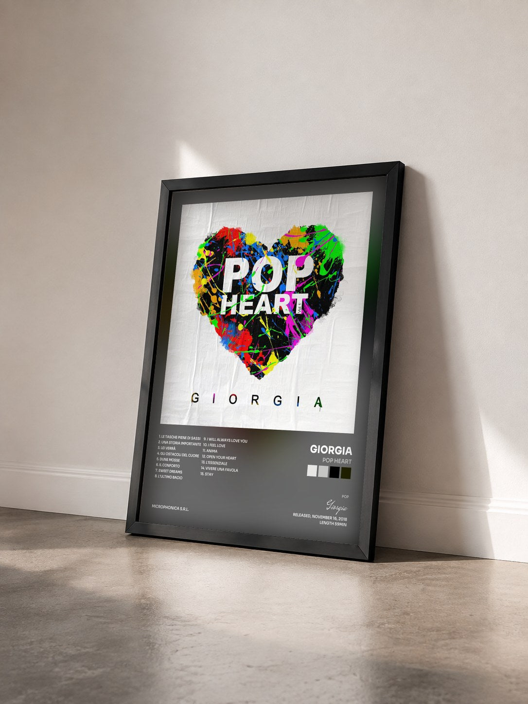#noir Tableau de l'album Pop Heart de Giorgia vu de trois quarts, cadre noir