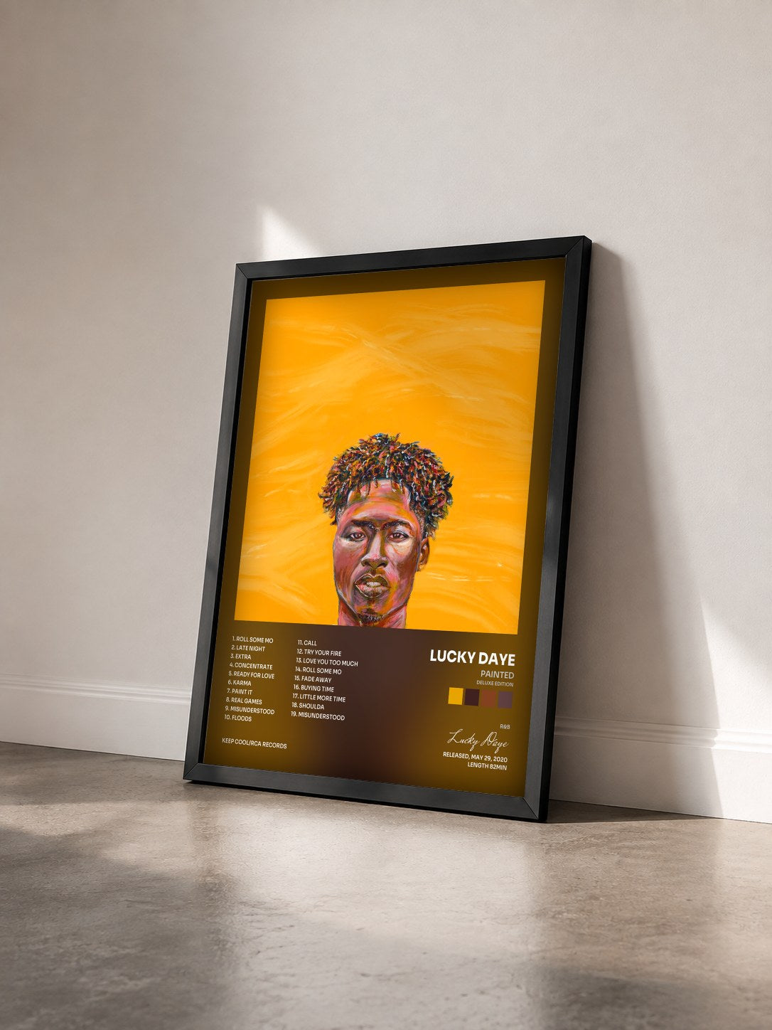 #noir Tableau de l'album Painted (Deluxe Edition) de Lucky Daye vu de trois quarts, cadre noir