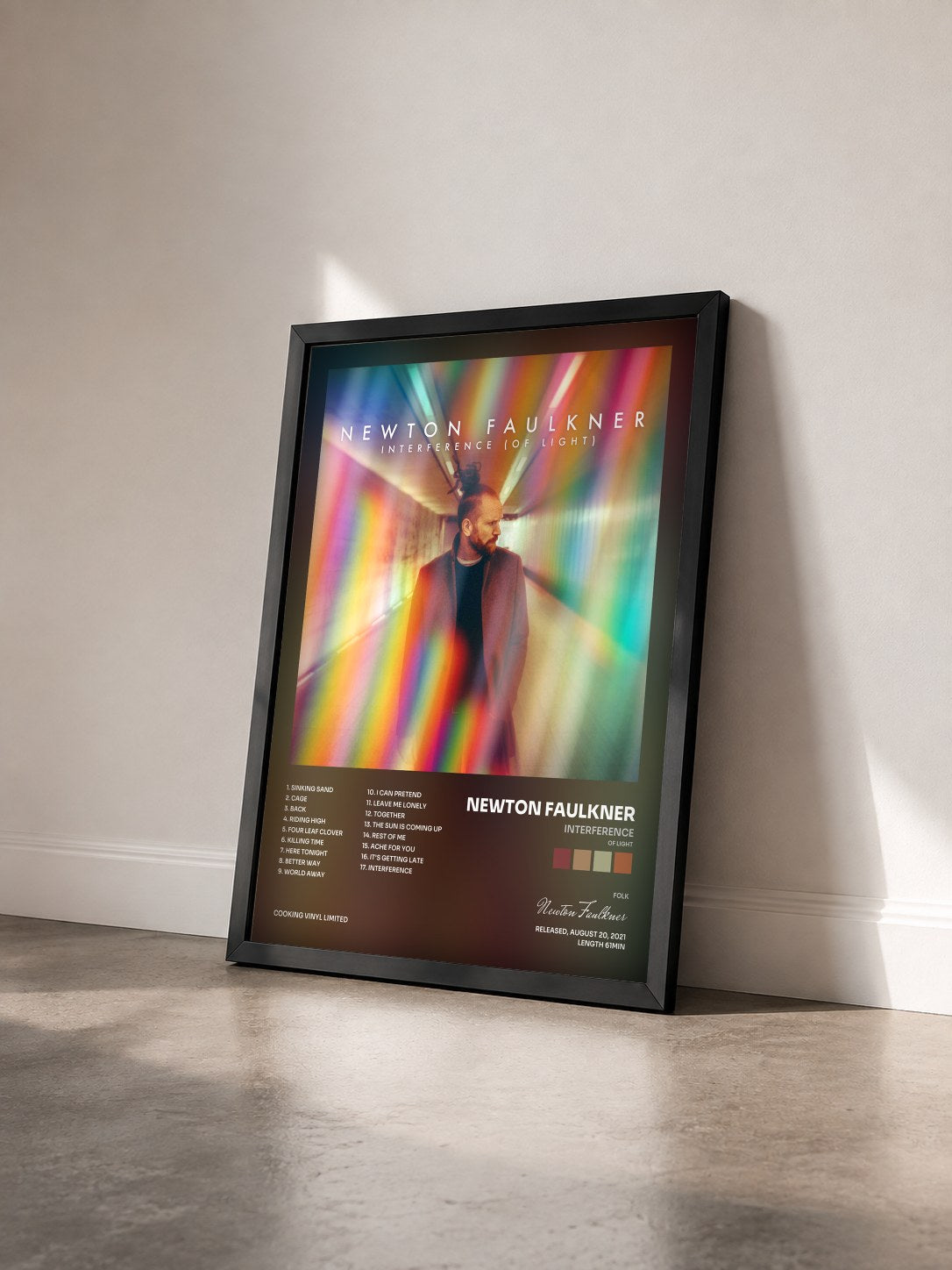 #noir Tableau de l'album Interference (Of Light) de Newton Faulkner vu de trois quarts, cadre noir