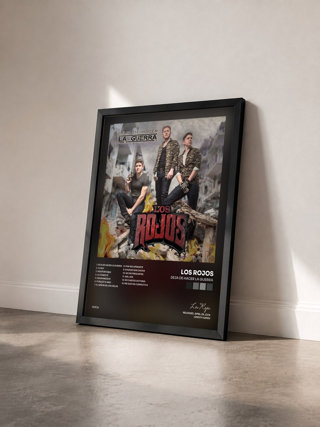 #noir Tableau de l'album Deja de Hacer la Guerra de Los Rojos vu de trois quarts, cadre noir