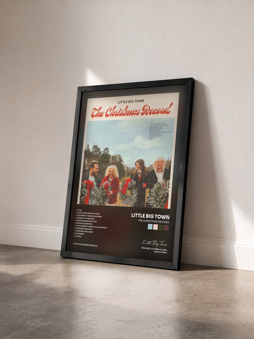 #noir Tableau de l'album The Christmas Record de Little Big Town vu de trois quarts, cadre noir
