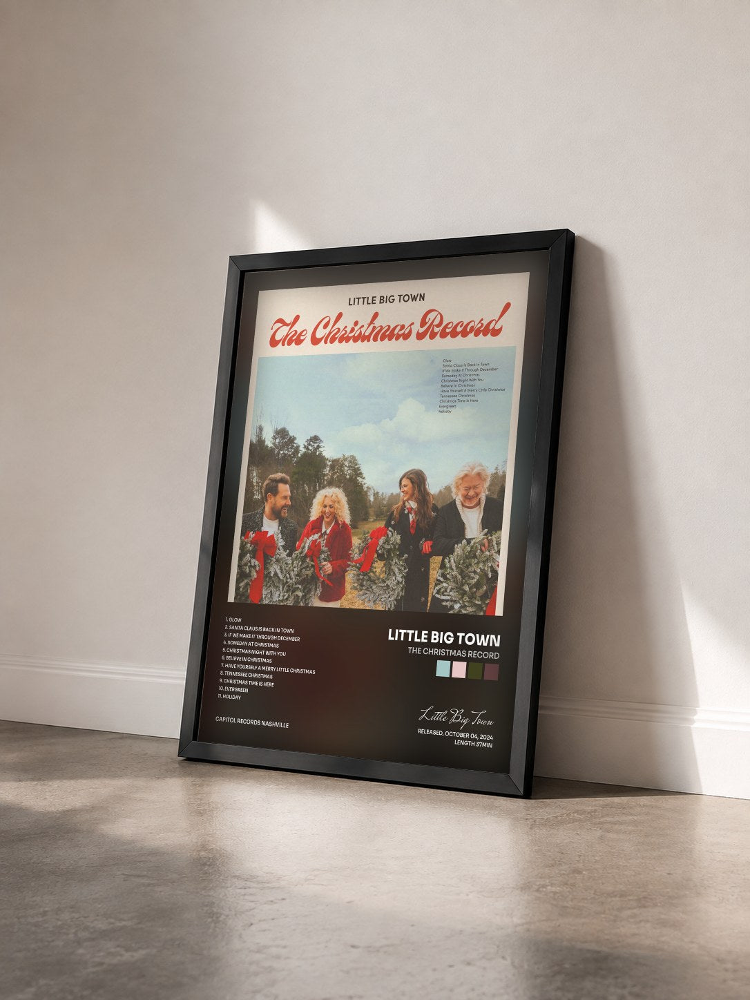 #noir Tableau de l'album The Christmas Record de Little Big Town vu de trois quarts, cadre noir