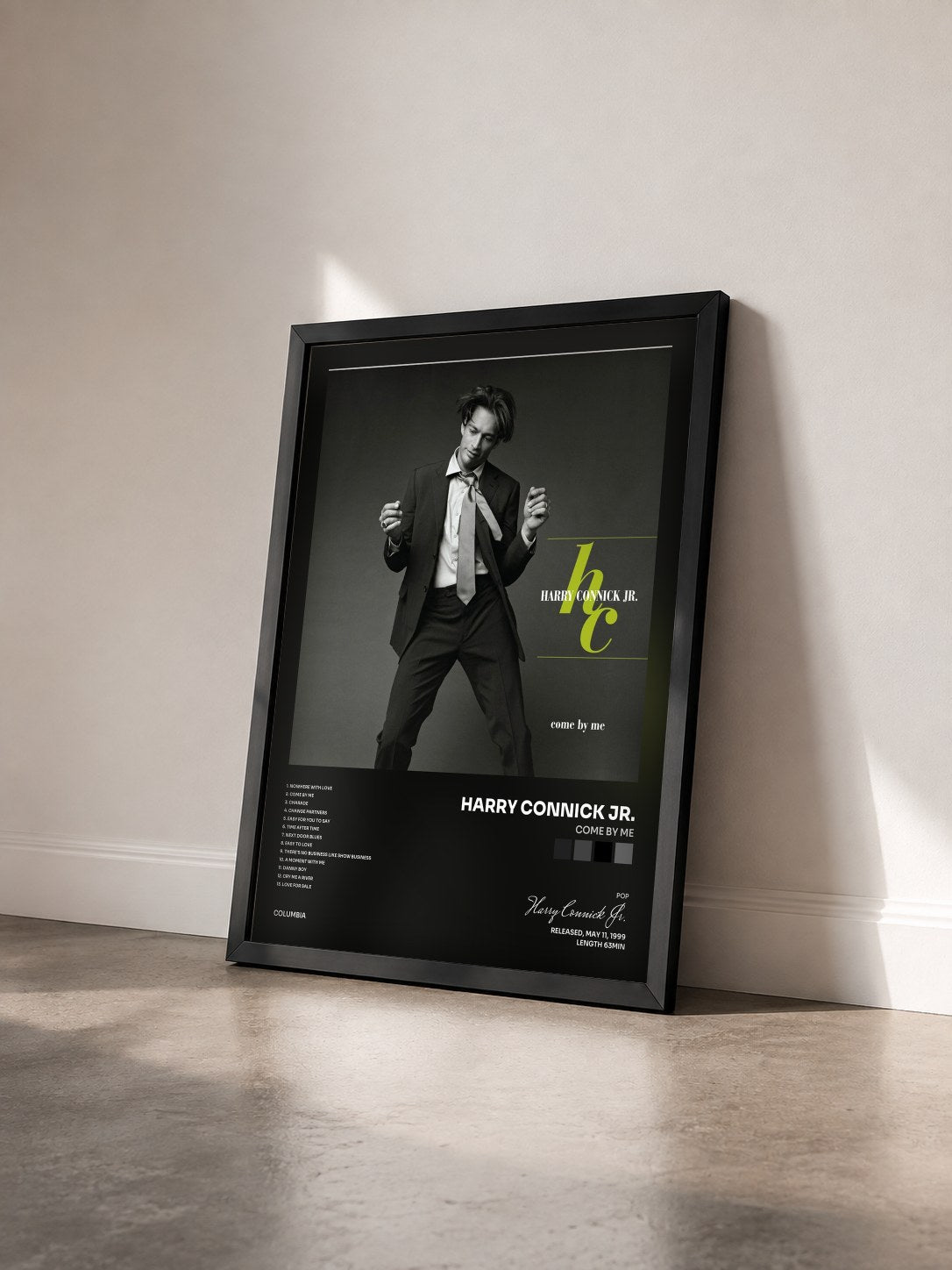 #noir Tableau de l'album Come By Me de Harry Connick Jr. vu de trois quarts, cadre noir
