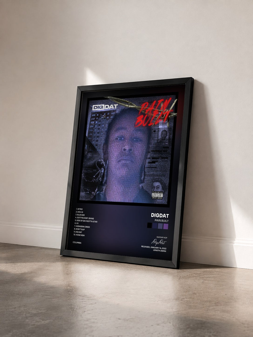 #noir Tableau de l'album Pain Built de DigDat vu de trois quarts, cadre noir