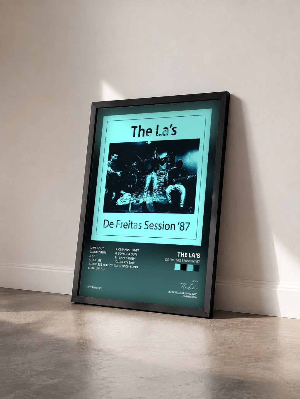 #noir Tableau de l'album De Freitas Session '87 de The La's vu de trois quarts, cadre noir