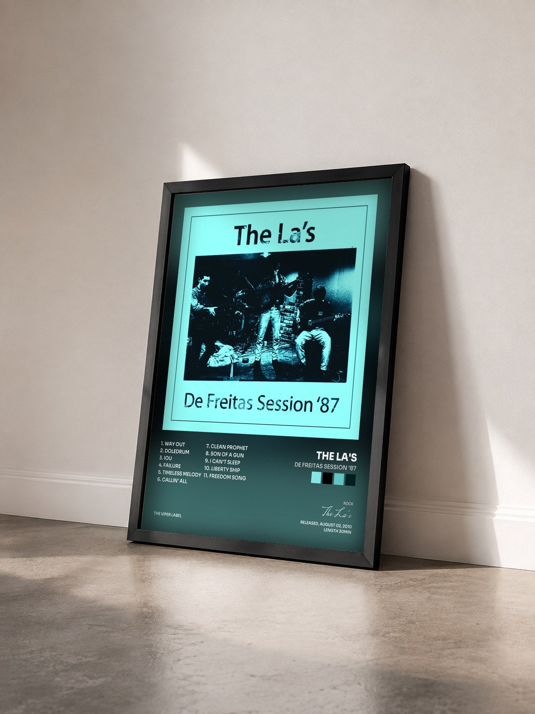#noir Tableau de l'album De Freitas Session '87 de The La's vu de trois quarts, cadre noir