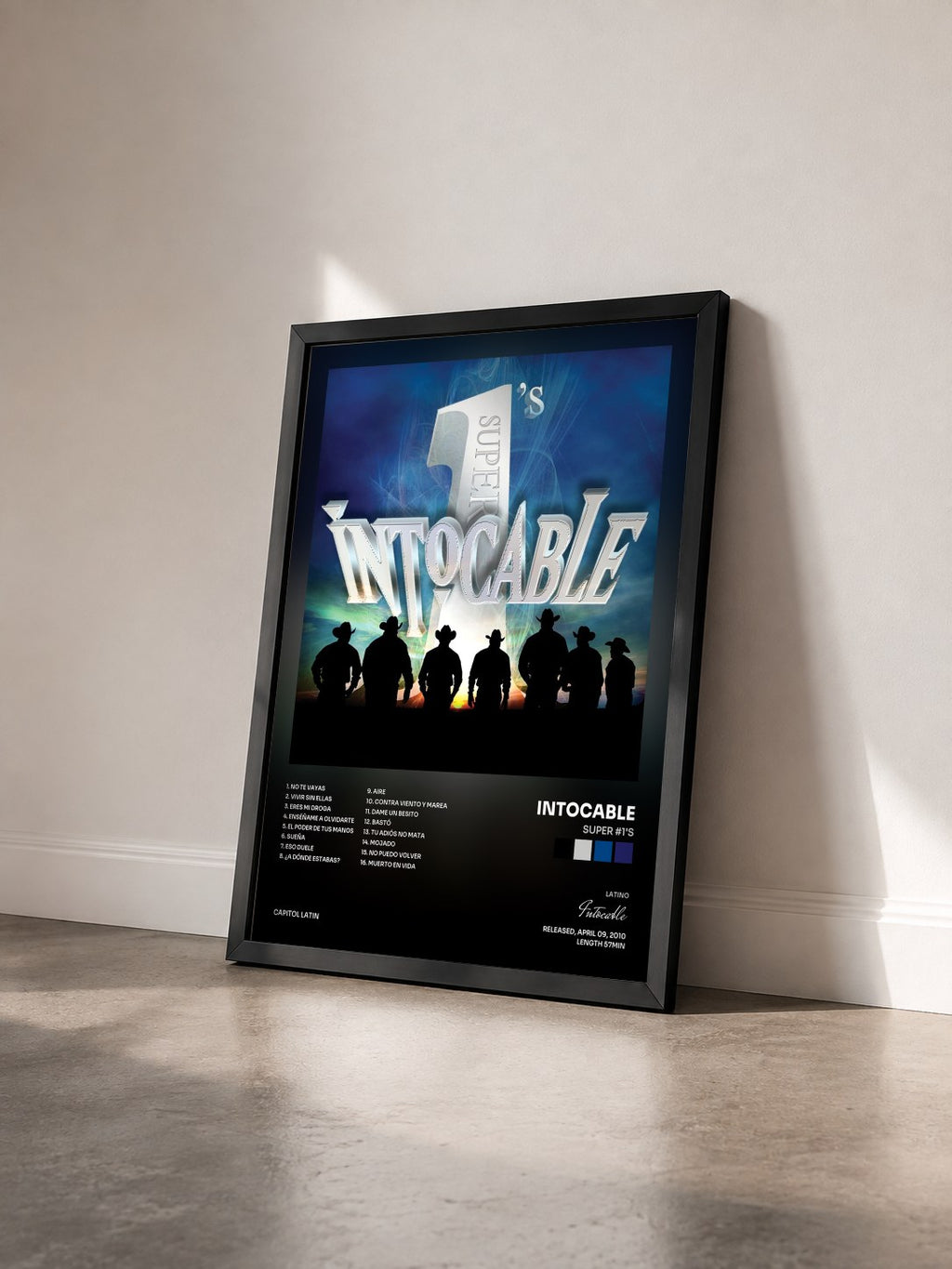 #noir Tableau de l'album Super #1's de Intocable vu de trois quarts, cadre noir