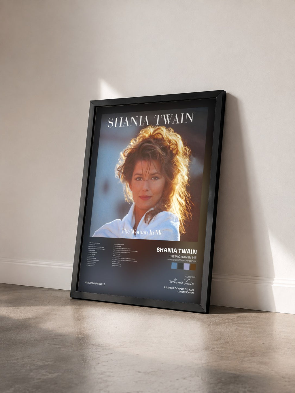 #noir Tableau de l'album The Woman In Me (Super Deluxe Diamond Edition) de Shania Twain vu de trois quarts, cadre noir