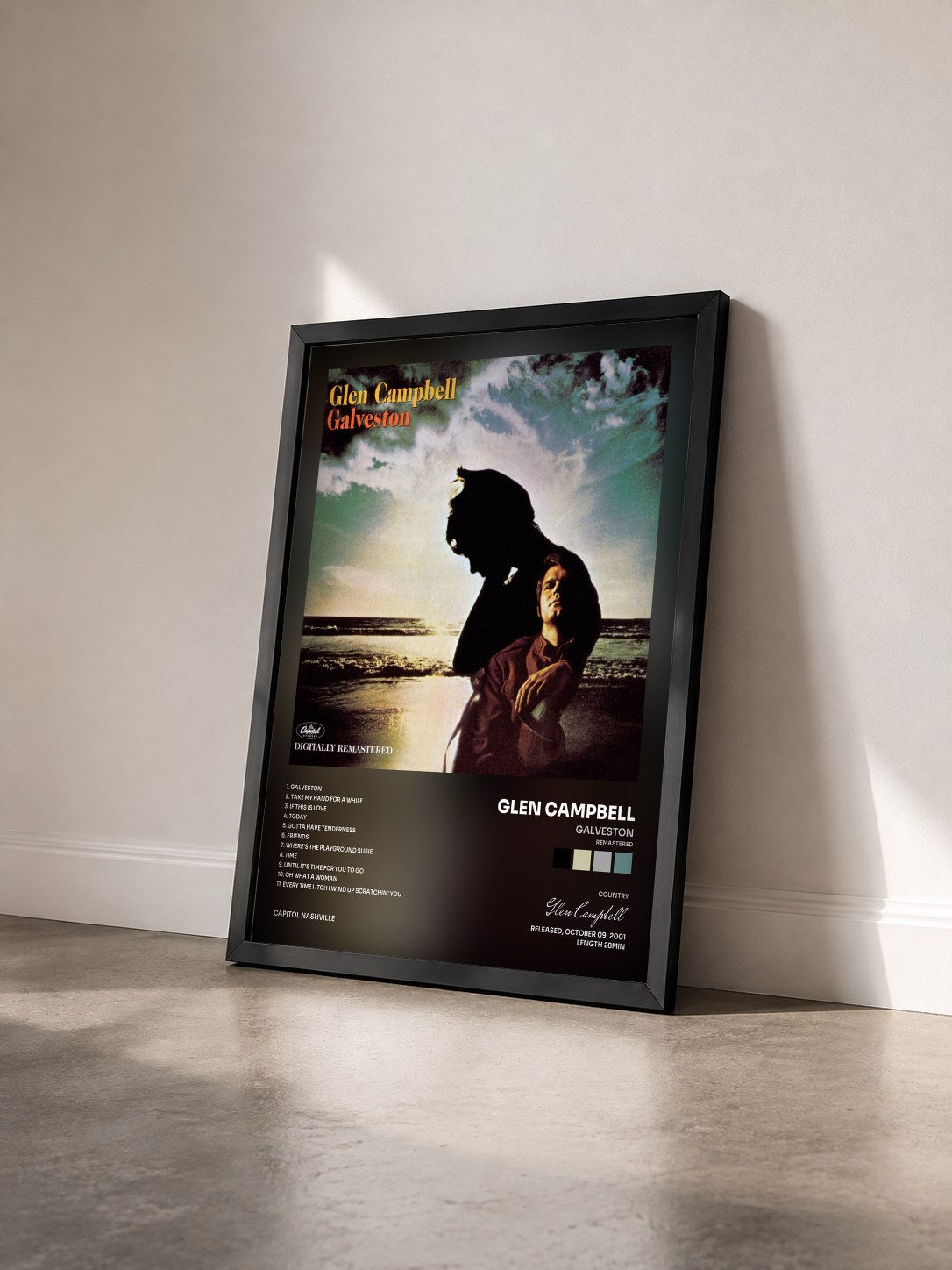#noir Tableau de l'album Galveston (Remastered) de Glen Campbell vu de trois quarts, cadre noir