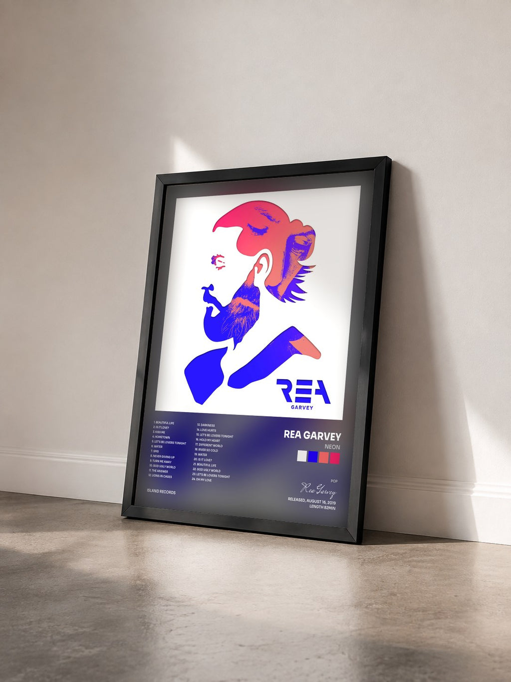 #noir Tableau de l'album Neon de Rea Garvey vu de trois quarts, cadre noir
