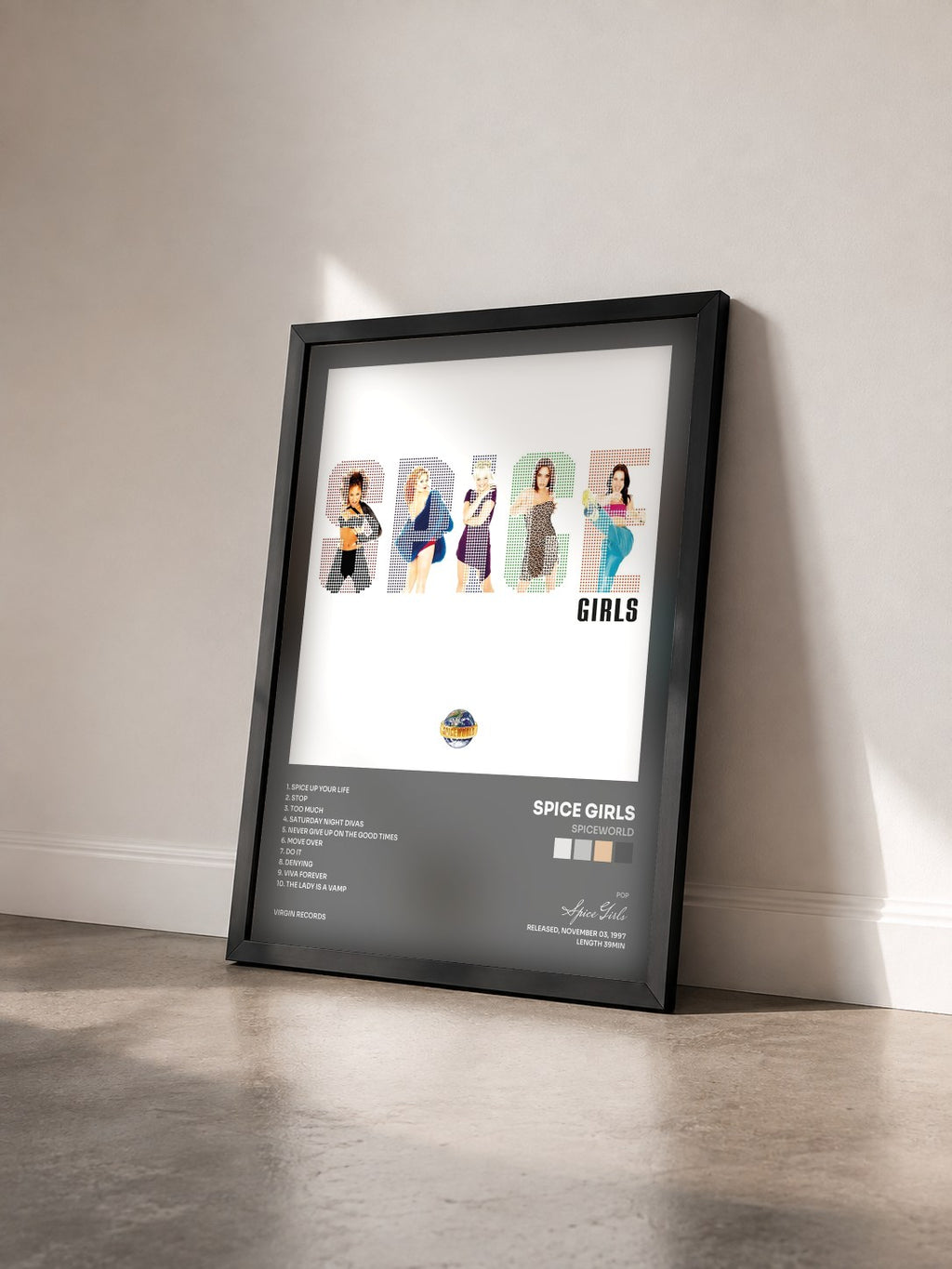 #noir Tableau de l'album Spiceworld de Spice Girls vu de trois quarts, cadre noir