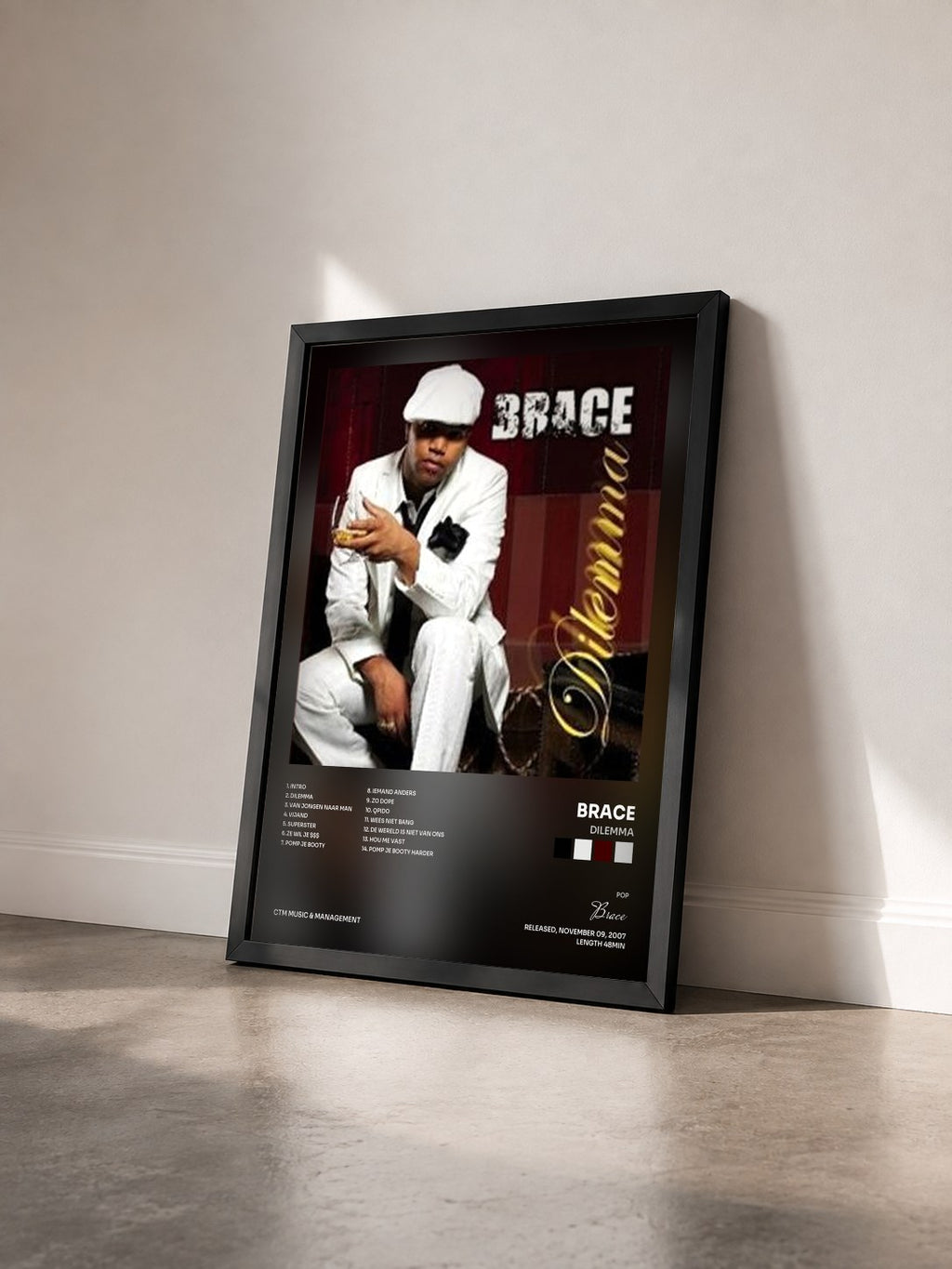#noir Tableau de l'album Dilemma de Brace vu de trois quarts, cadre noir