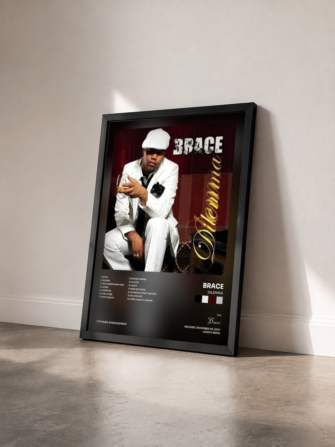 #noir Tableau de l'album Dilemma de Brace vu de trois quarts, cadre noir