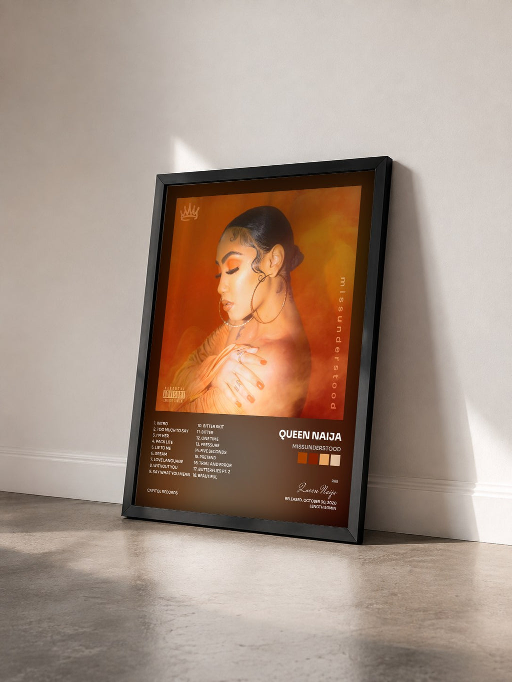 #noir Tableau de l'album missunderstood de Queen Naija vu de trois quarts, cadre noir