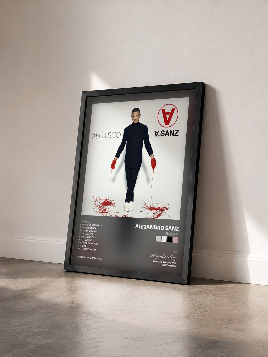 #noir Tableau de l'album #ELDISCO de Alejandro Sanz vu de trois quarts, cadre noir