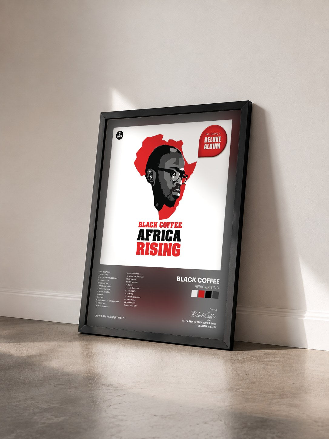 #noir Tableau de l'album Africa Rising de Black Coffee vu de trois quarts, cadre noir