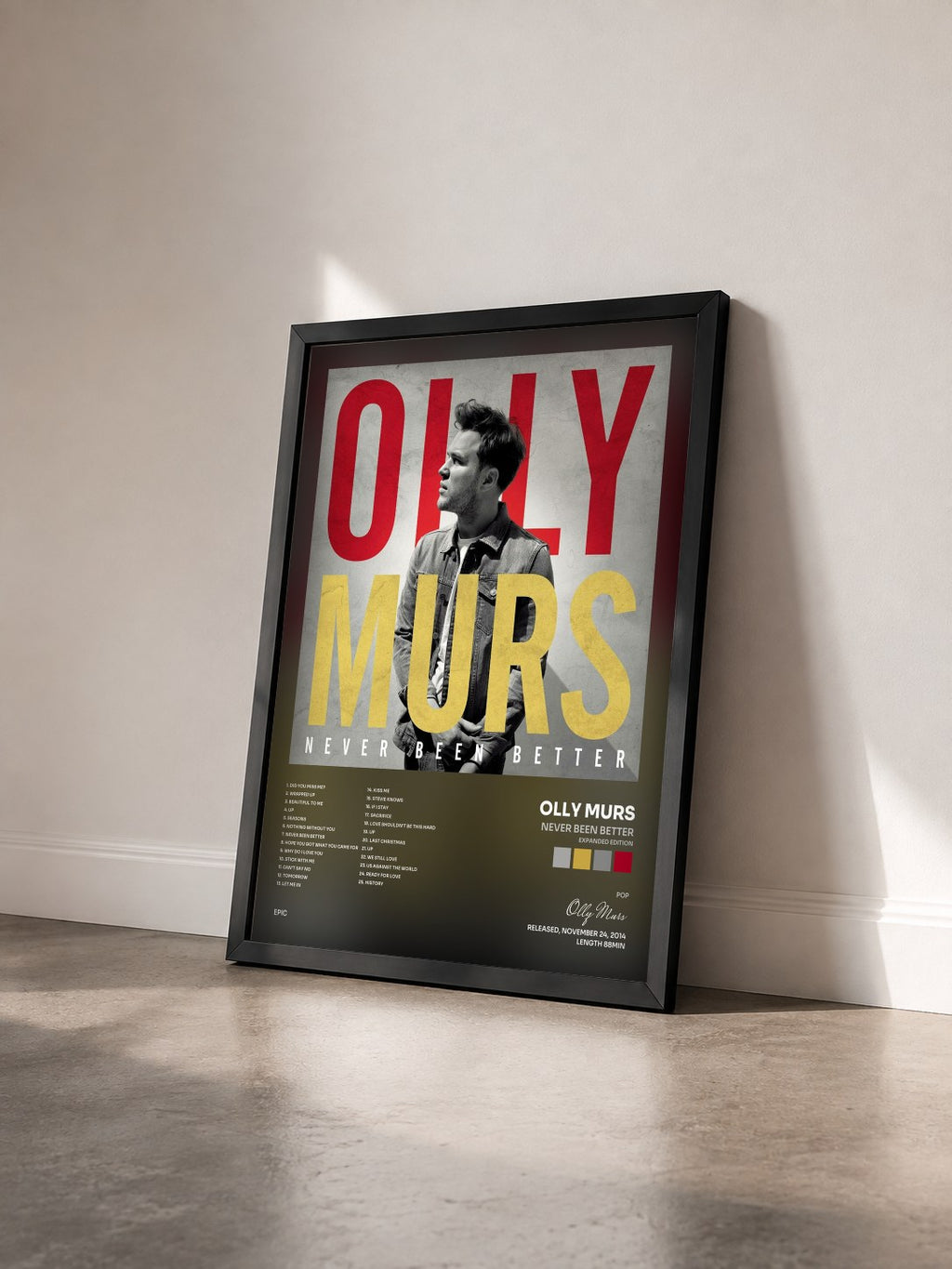 #noir Tableau de l'album Never Been Better (Expanded Edition) de Olly Murs vu de trois quarts, cadre noir