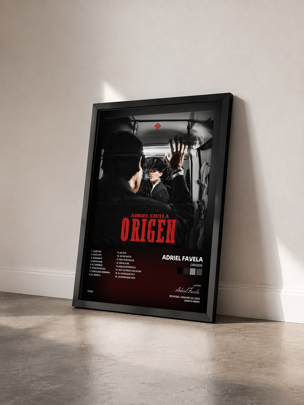 #noir Tableau de l'album Origen de Adriel Favela vu de trois quarts, cadre noir