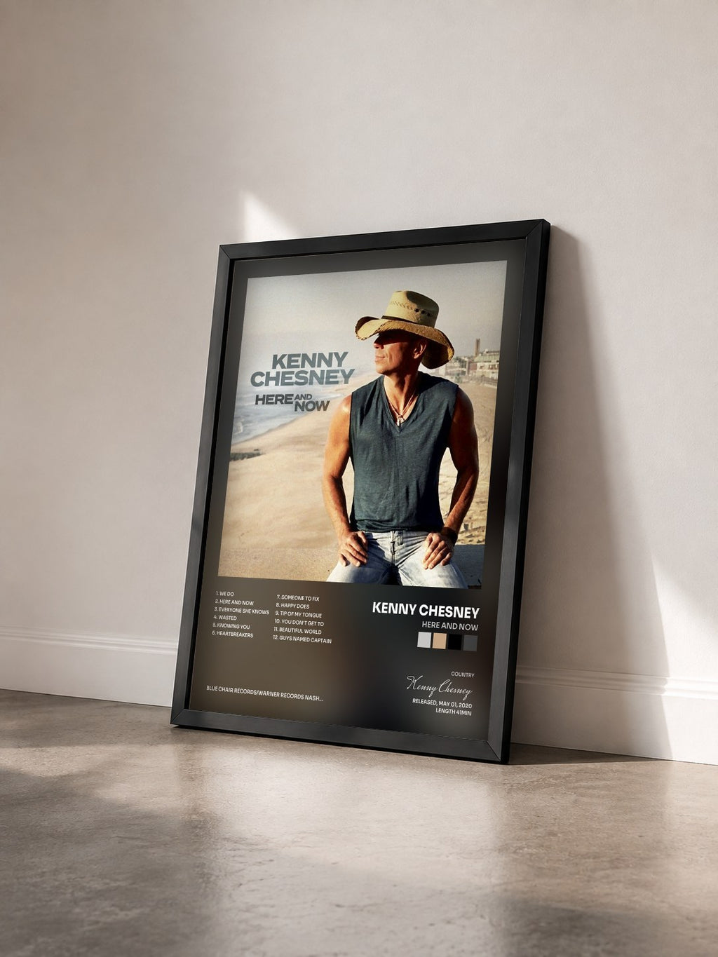 #noir Tableau de l'album Here And Now de Kenny Chesney vu de trois quarts, cadre noir