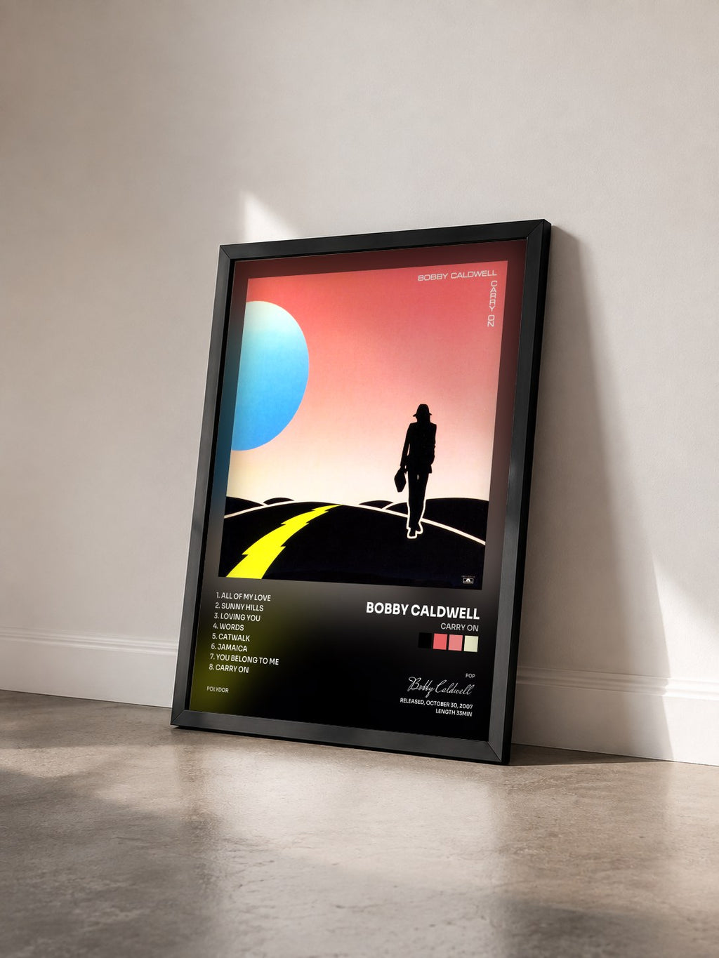 #noir Tableau de l'album Carry On de Bobby Caldwell vu de trois quarts, cadre noir
