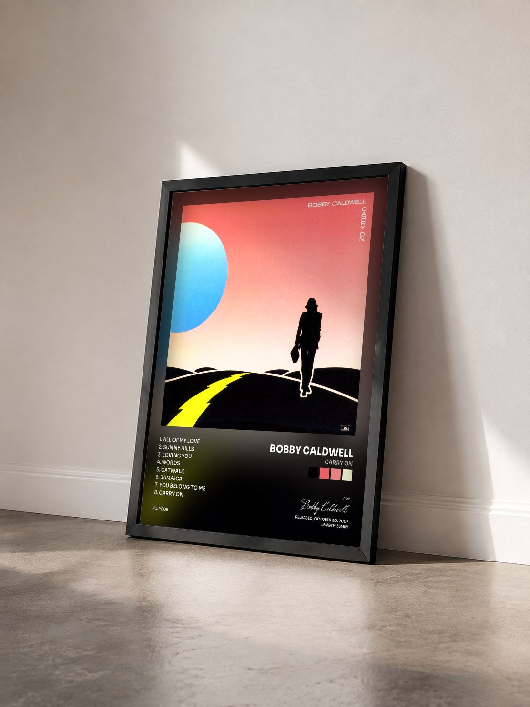 #noir Tableau de l'album Carry On de Bobby Caldwell vu de trois quarts, cadre noir