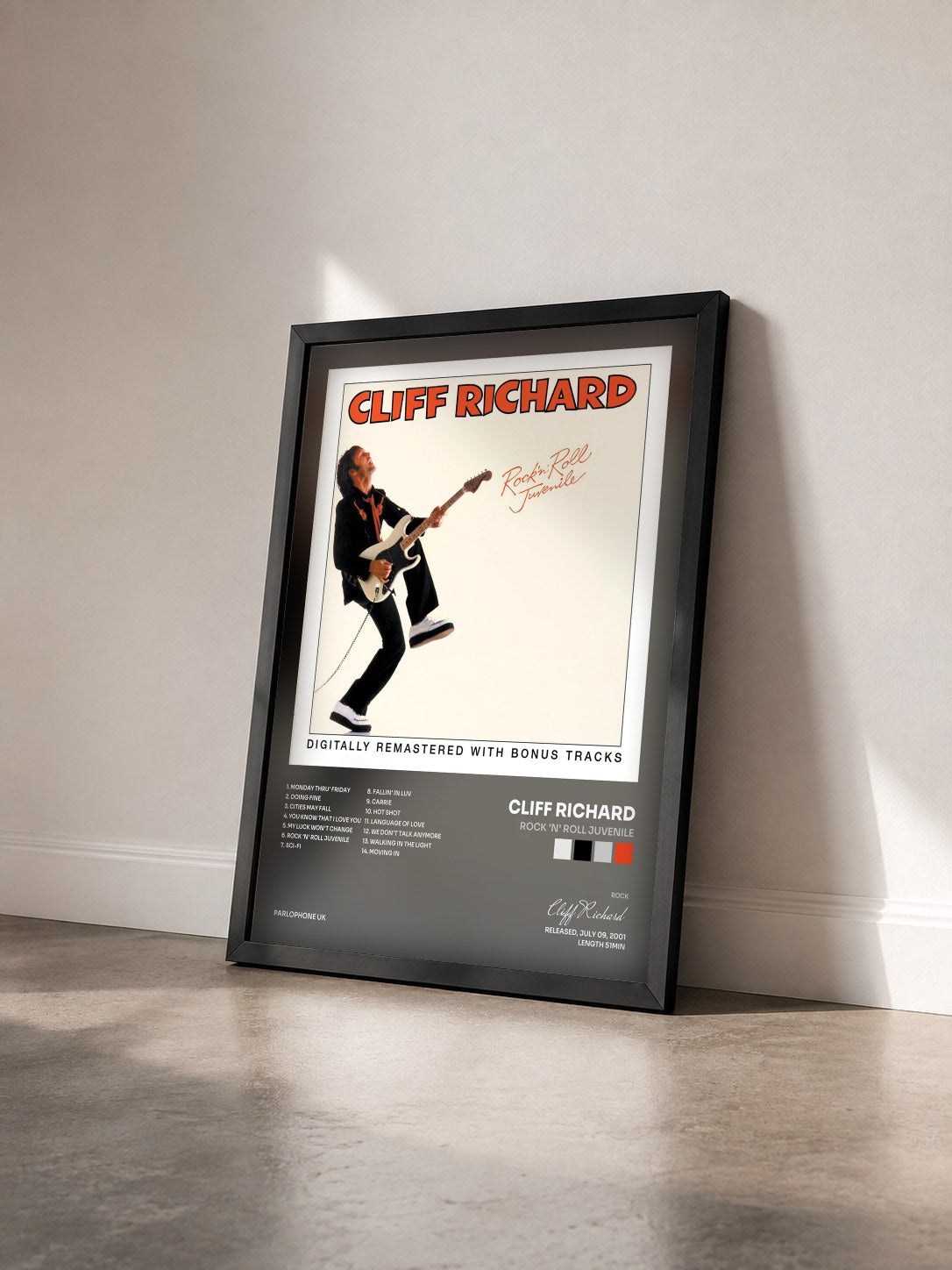 #noir Tableau de l'album Rock 'n' Roll Juvenile de Cliff Richard vu de trois quarts, cadre noir