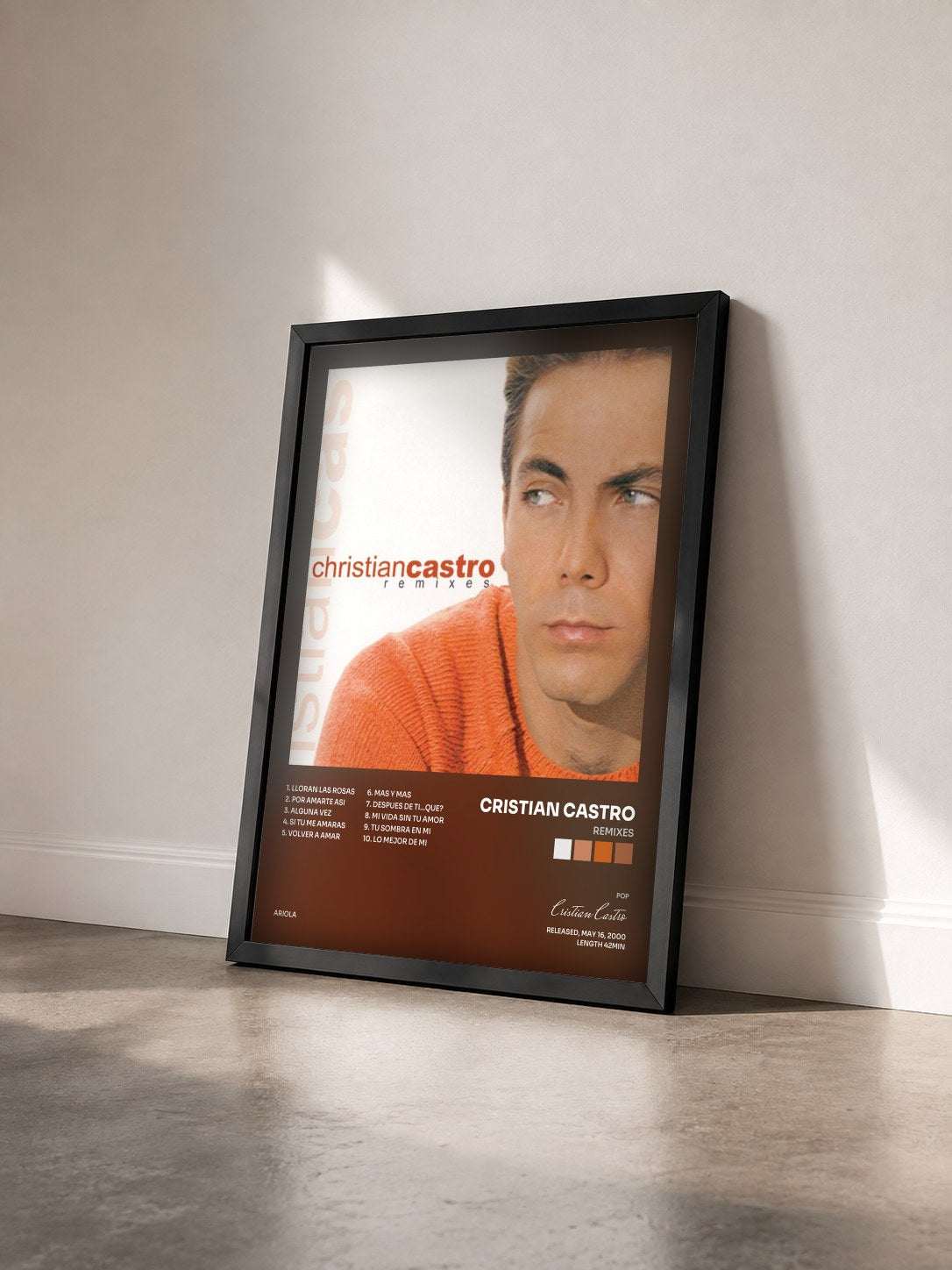 #noir Tableau de l'album Remixes de Cristian Castro vu de trois quarts, cadre noir