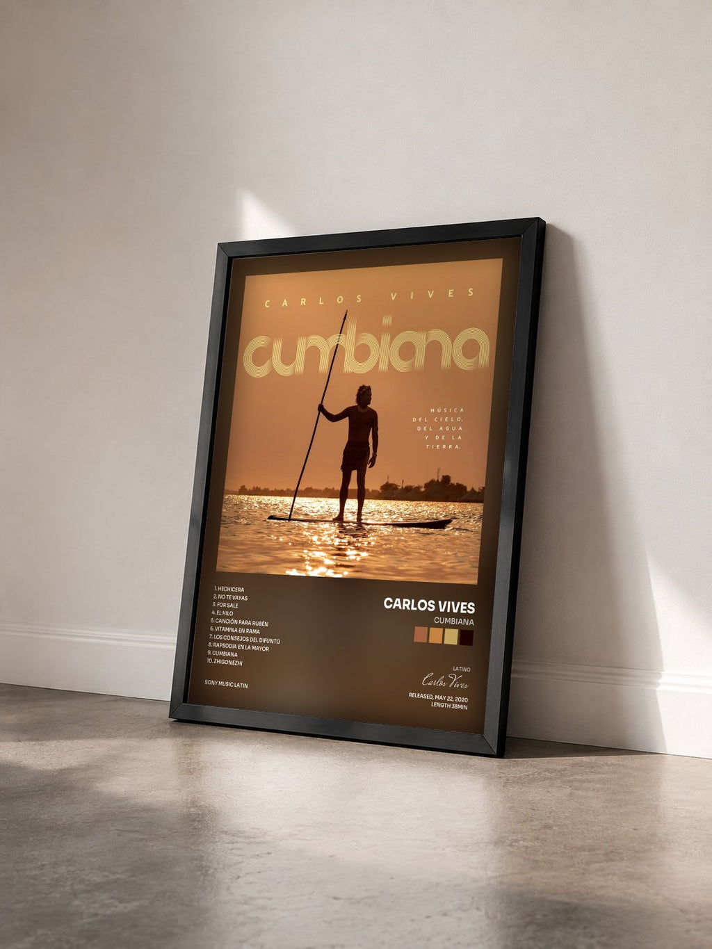 #noir Tableau de l'album Cumbiana de Carlos Vives vu de trois quarts, cadre noir