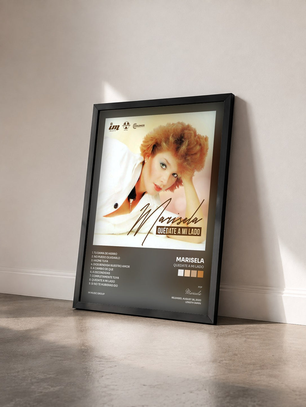 #noir Tableau de l'album Quedate A Mi Lado de Marisela vu de trois quarts, cadre noir