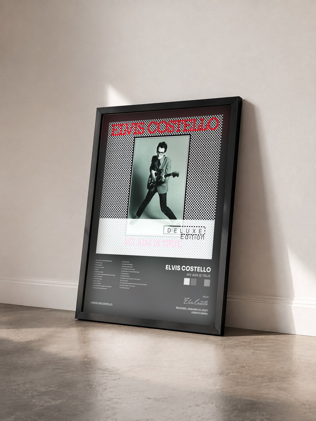 #noir Tableau de l'album My Aim Is True de Elvis Costello vu de trois quarts, cadre noir