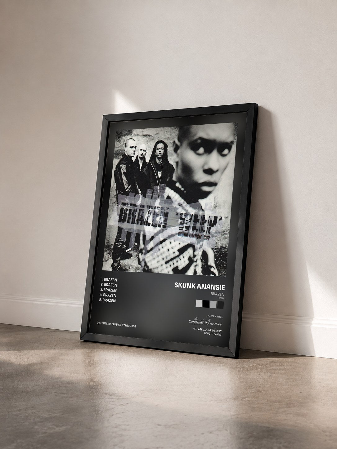 #noir Tableau de l'album Brazen (Weep) de Skunk Anansie vu de trois quarts, cadre noir