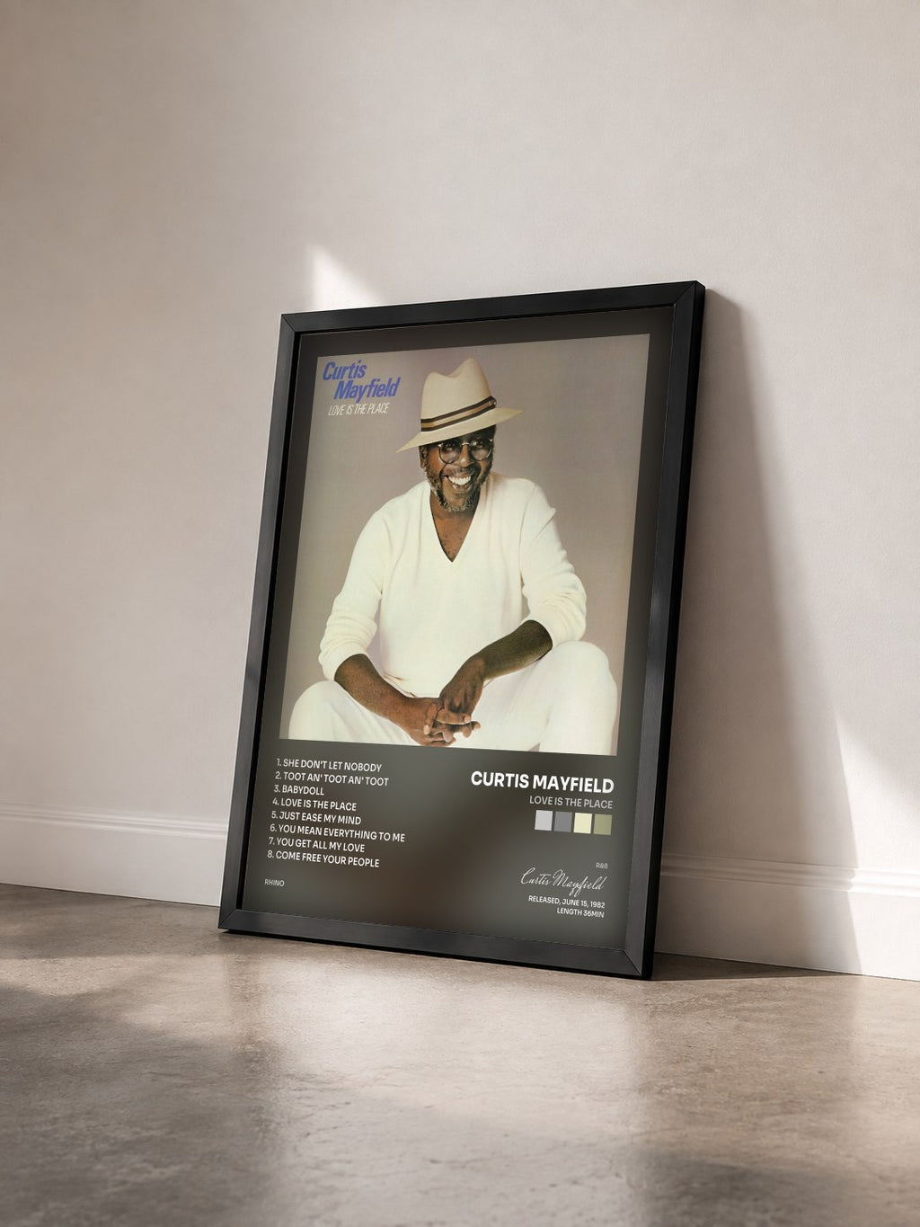 #noir Tableau de l'album Love Is the Place de Curtis Mayfield vu de trois quarts, cadre noir
