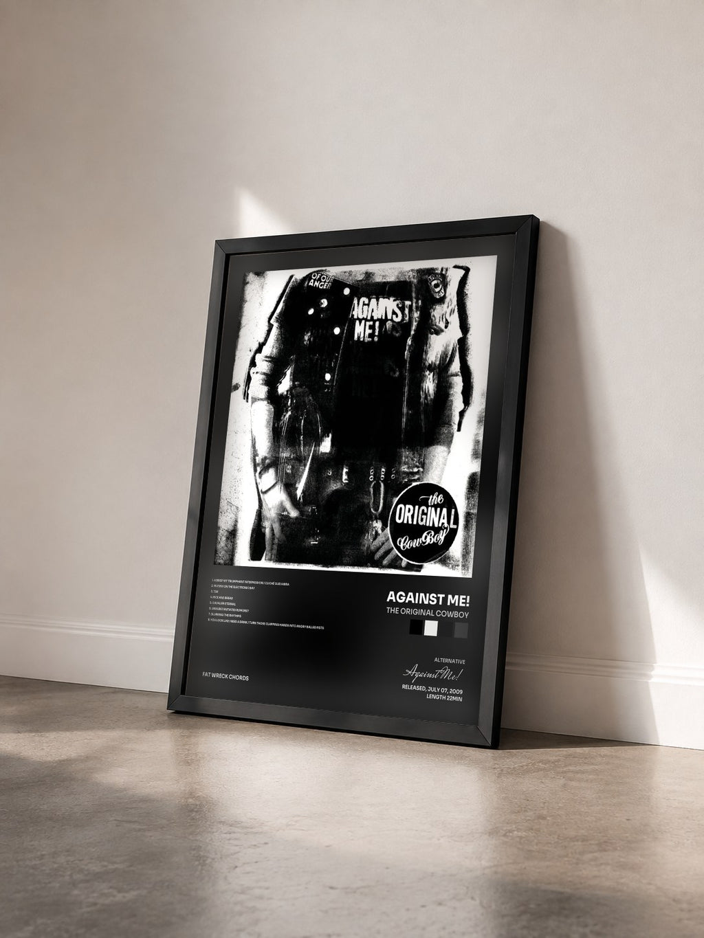 #noir Tableau de l'album The Original Cowboy de Against Me! vu de trois quarts, cadre noir