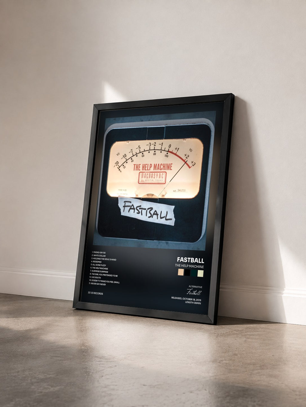 #noir Tableau de l'album The Help Machine de Fastball vu de trois quarts, cadre noir