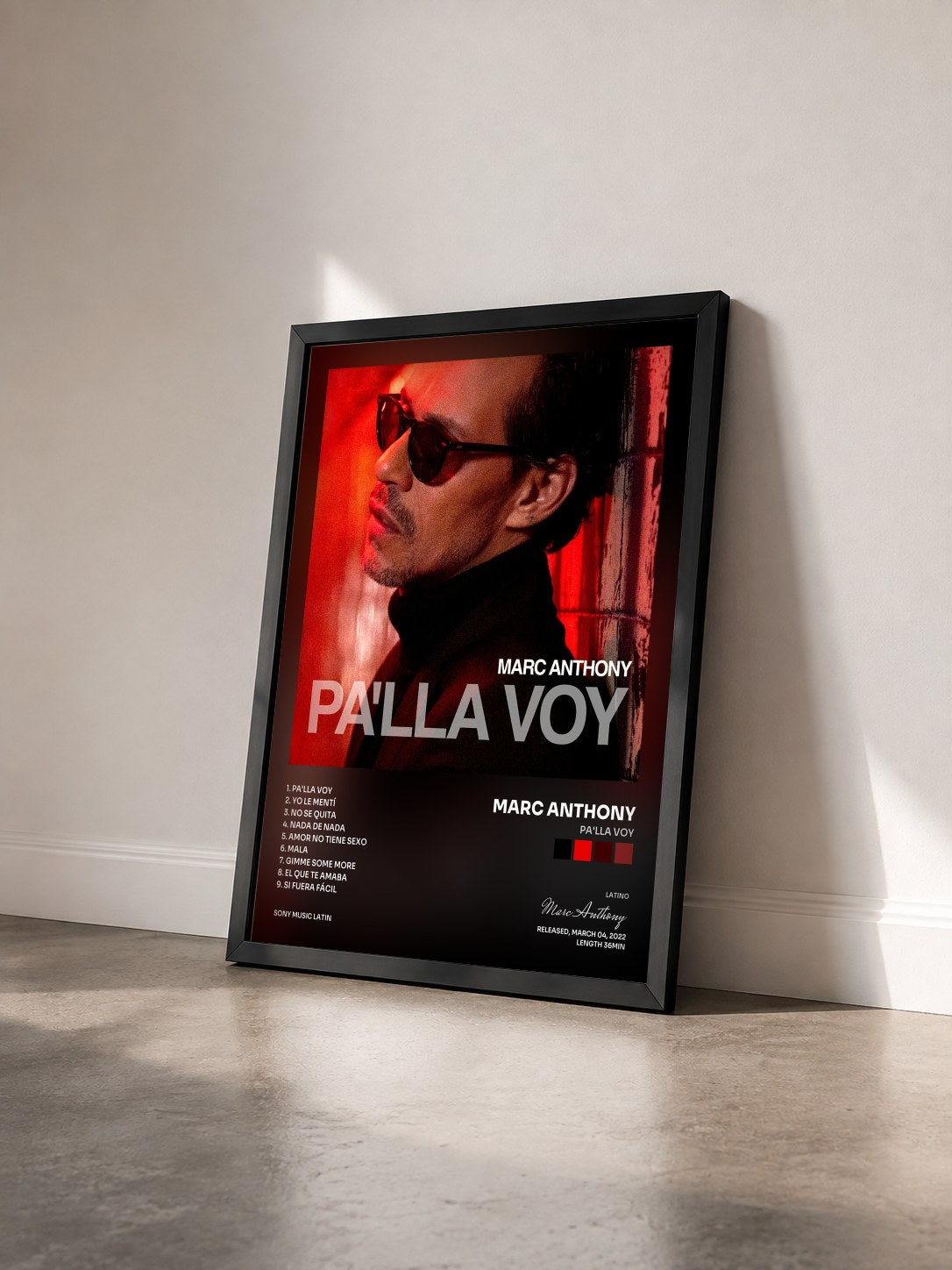 #noir Tableau de l'album Pa'lla Voy de Marc Anthony vu de trois quarts, cadre noir