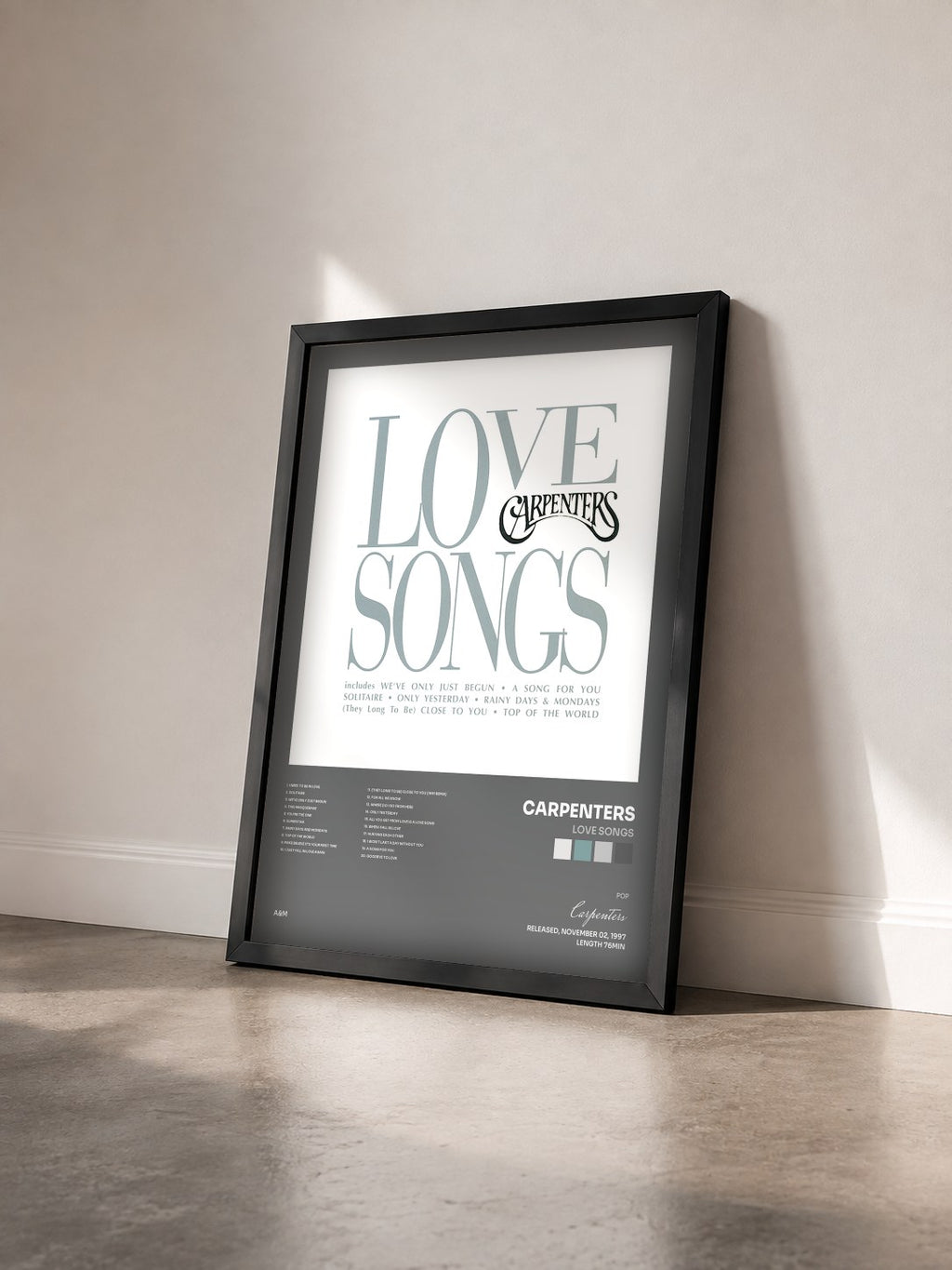 #noir Tableau de l'album Love Songs de Carpenters vu de trois quarts, cadre noir