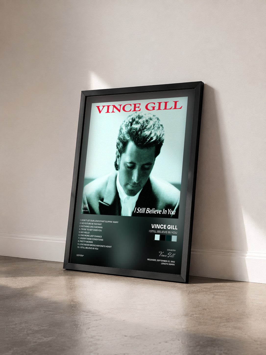 #noir Tableau de l'album I Still Believe In You de Vince Gill vu de trois quarts, cadre noir