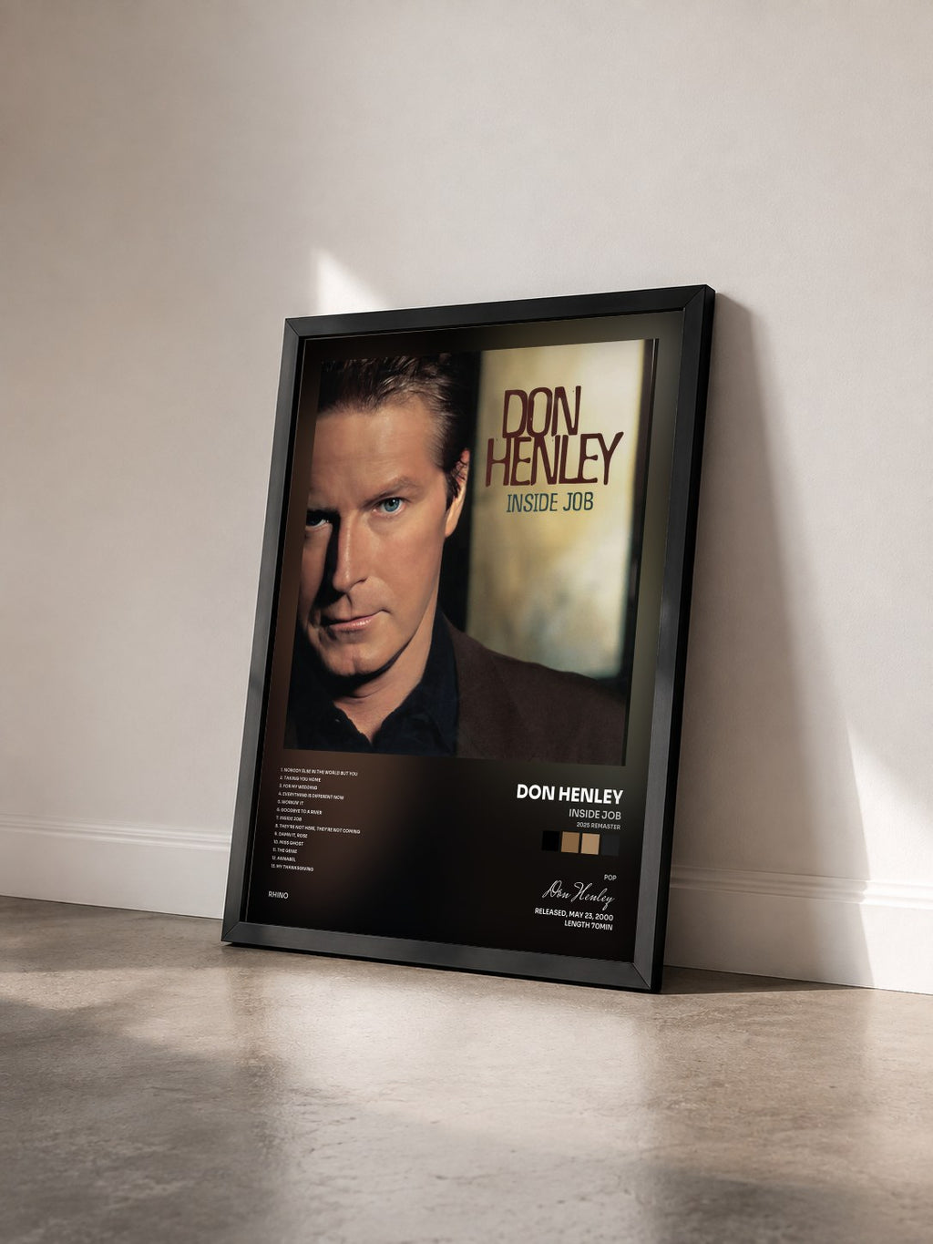#noir Tableau de l'album Inside Job (2025 Remaster) de Don Henley vu de trois quarts, cadre noir