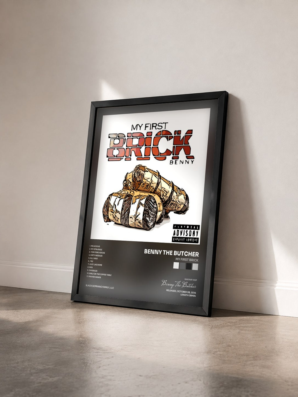 #noir Tableau de l'album My First Brick de Benny The Butcher vu de trois quarts, cadre noir
